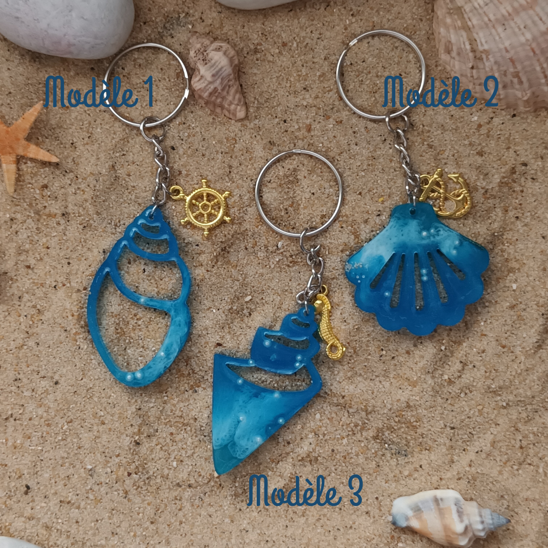 Porte-clés coquillage Ocean Fantasy en résine – Perle flottante et charme doré mer